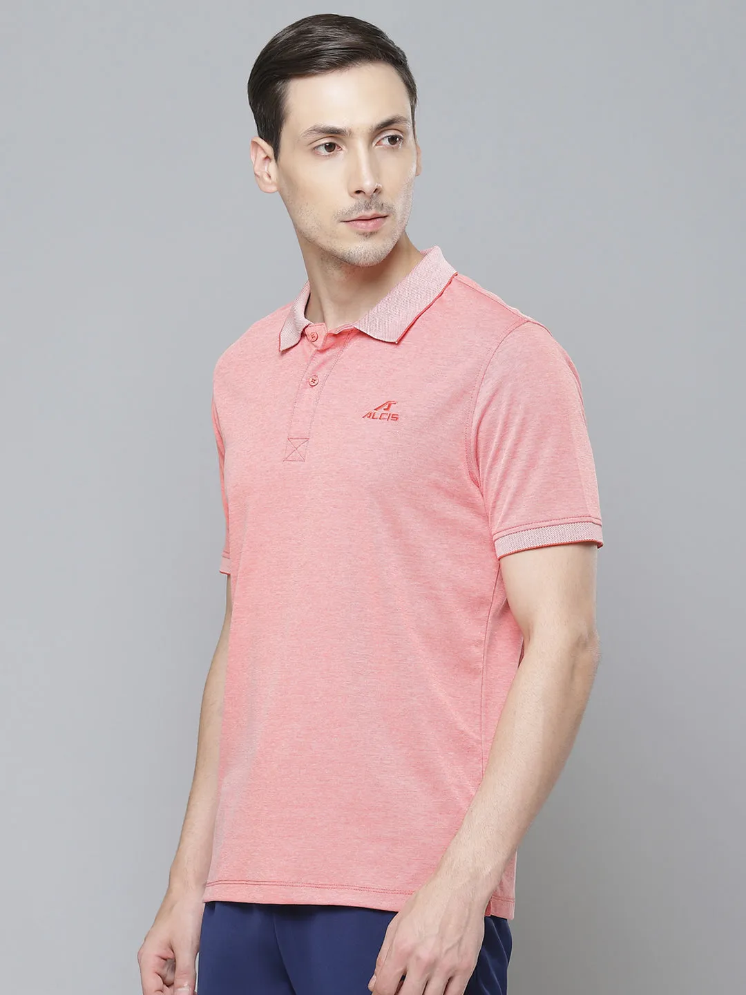 Alcis Men Peach-Coloured Solid Polo Collar T-shirt Clubhouse Attire