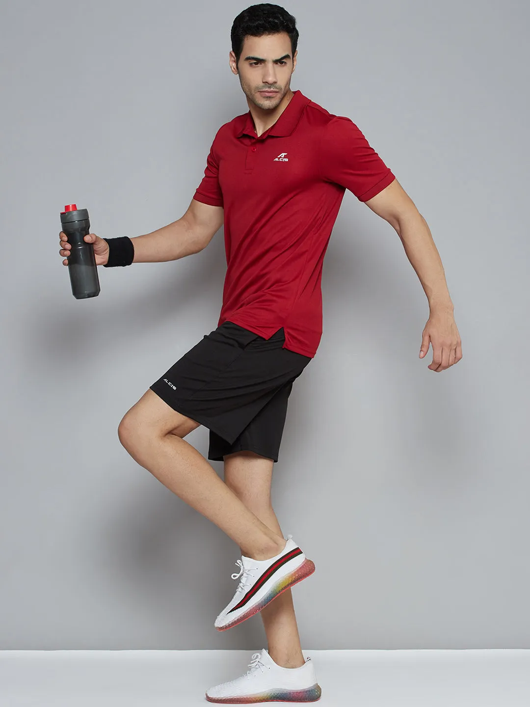 Alcis Men Maroon Solid Polo Collar Slim Fit Wonder T-shirt UV Protection