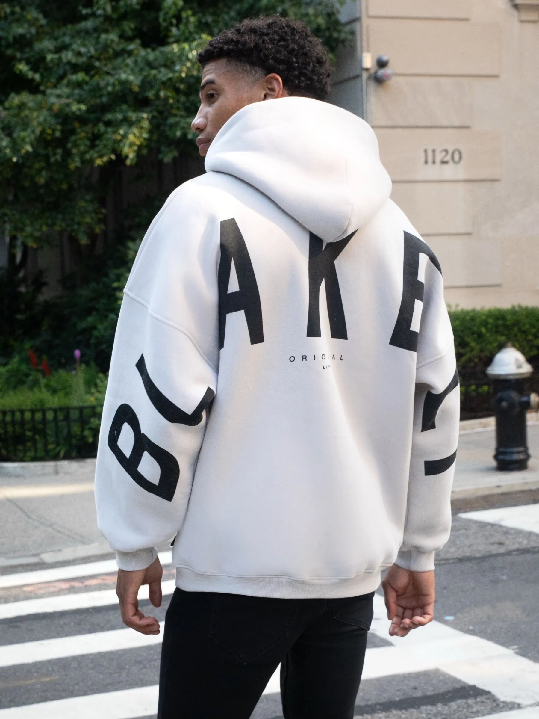 Idris Oversized Hoodie - Stone Lifestyle Motion