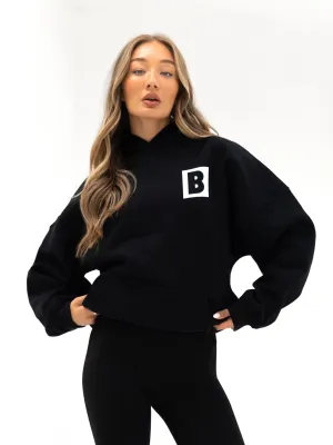 Gerbil like sophisticated appearance Offset Oversized Hoodie - Black