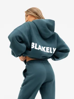 Amelie Oversized Hoodie - Teal Green Elephant like school setting