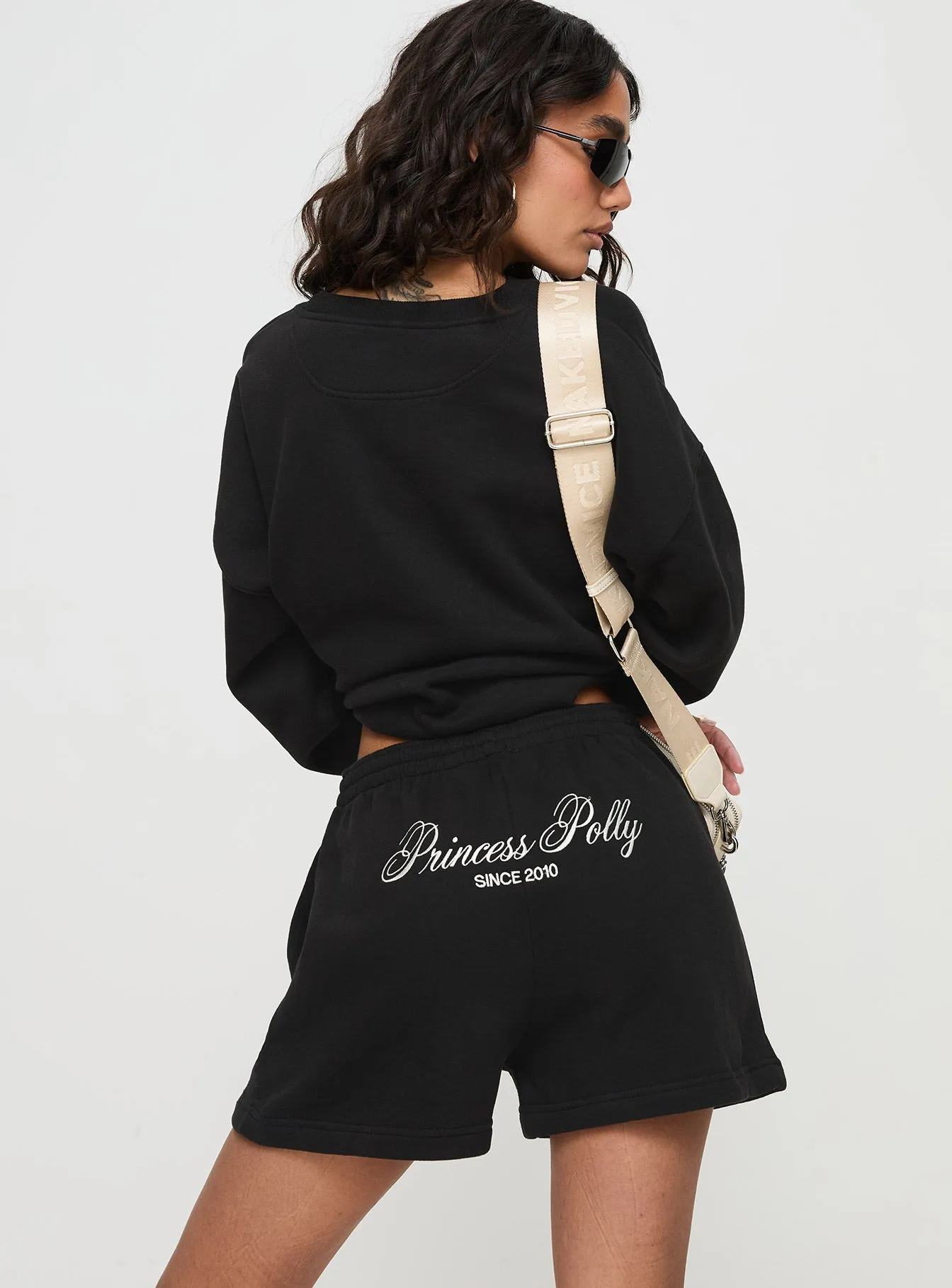 DurableBlend Princess Polly Track Shorts Cursive Text Black Sand