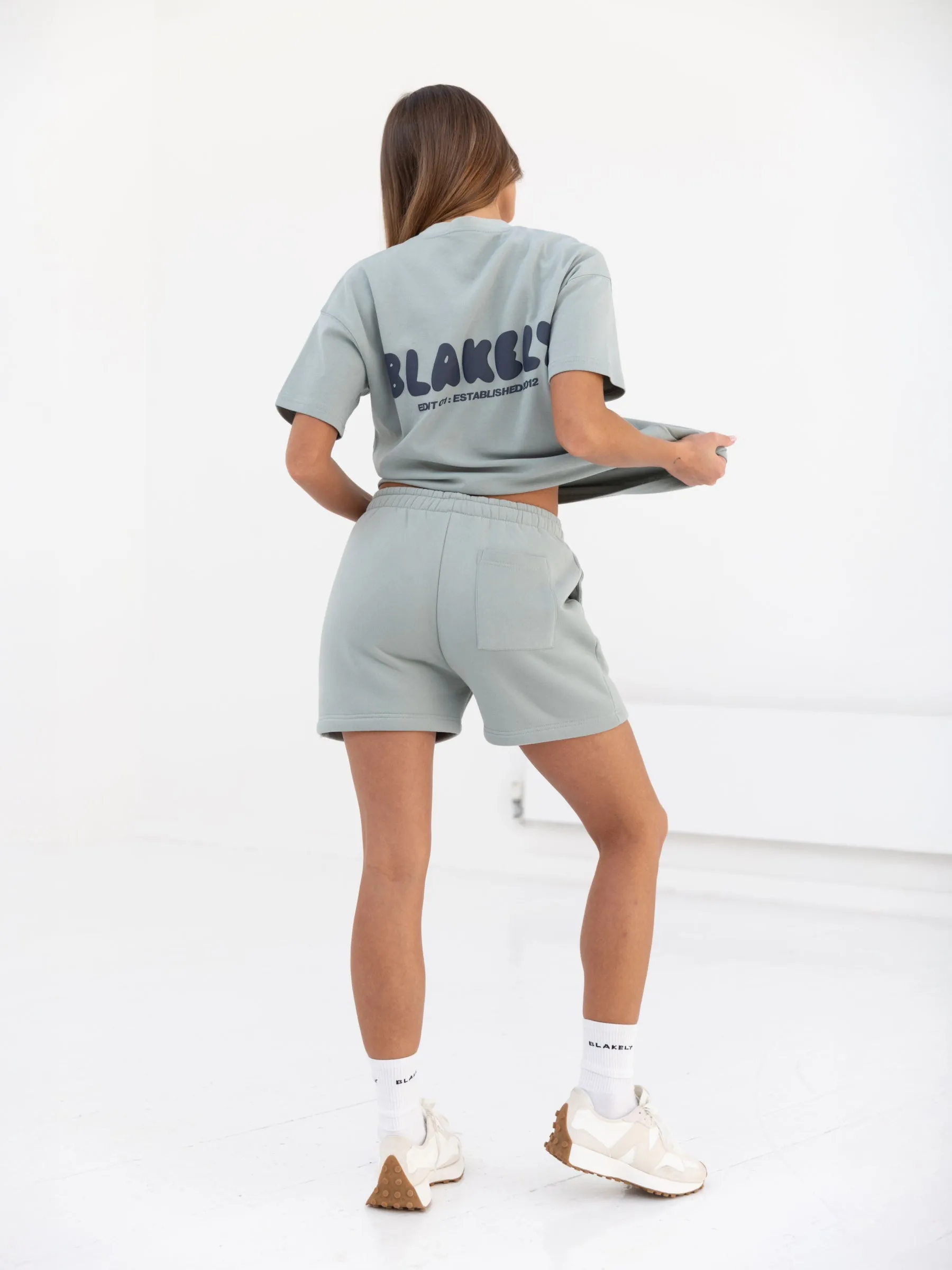 Vented Hem Details warm tones Cloud Print Jogger Shorts - Mineral Blue