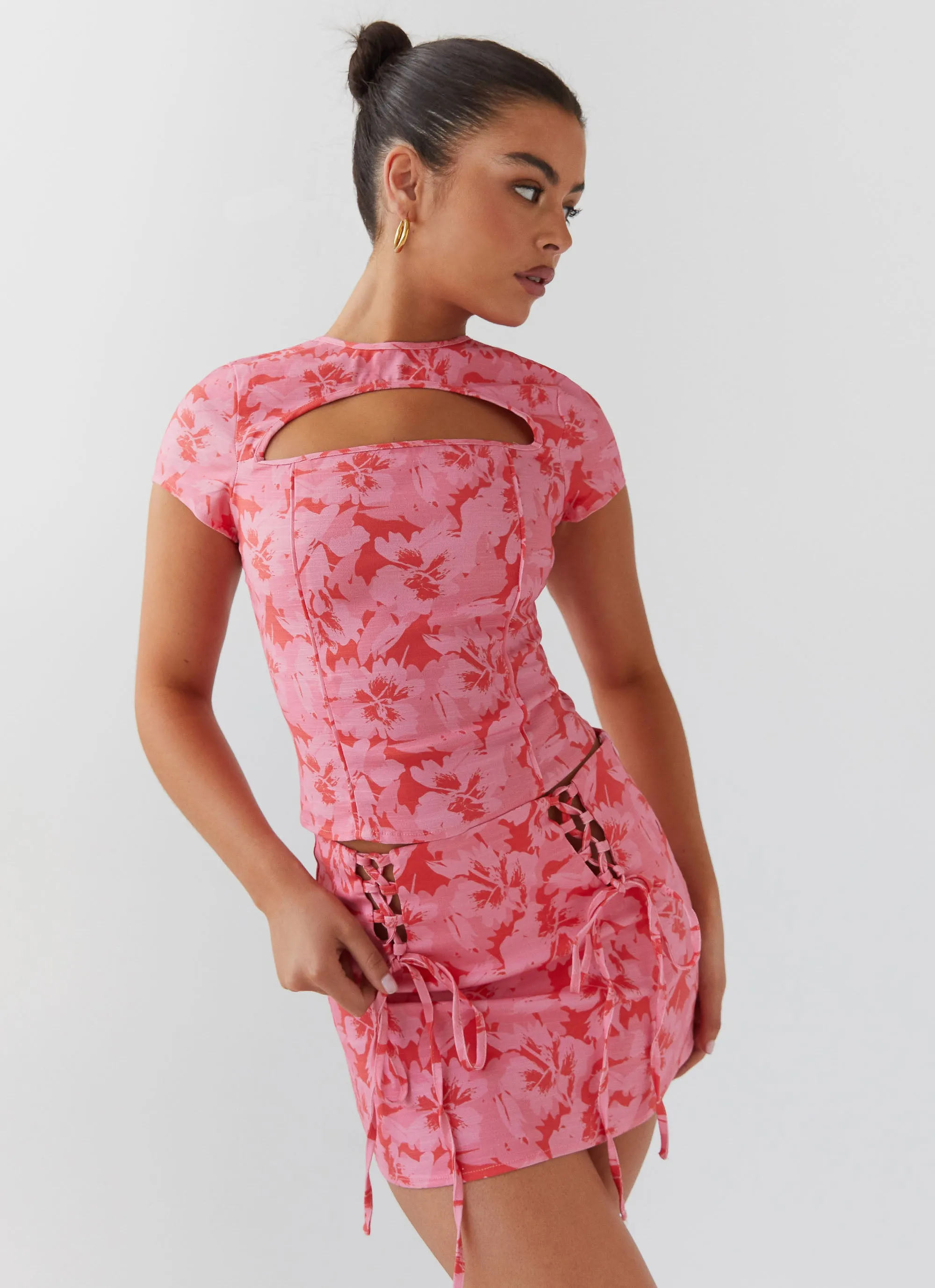 Delicate Finish Glossy Fabric Take A Sip Tie Mini Skirt - Cherry Blossom