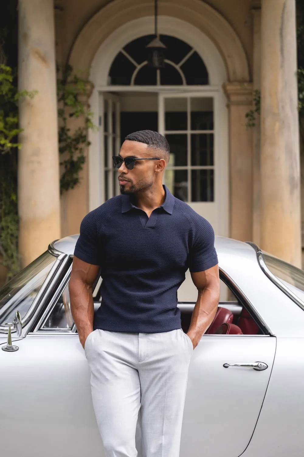 MoistureManagement System Flexible Collar Band Textured Knitted Open Collar Polo Shirt in Navy