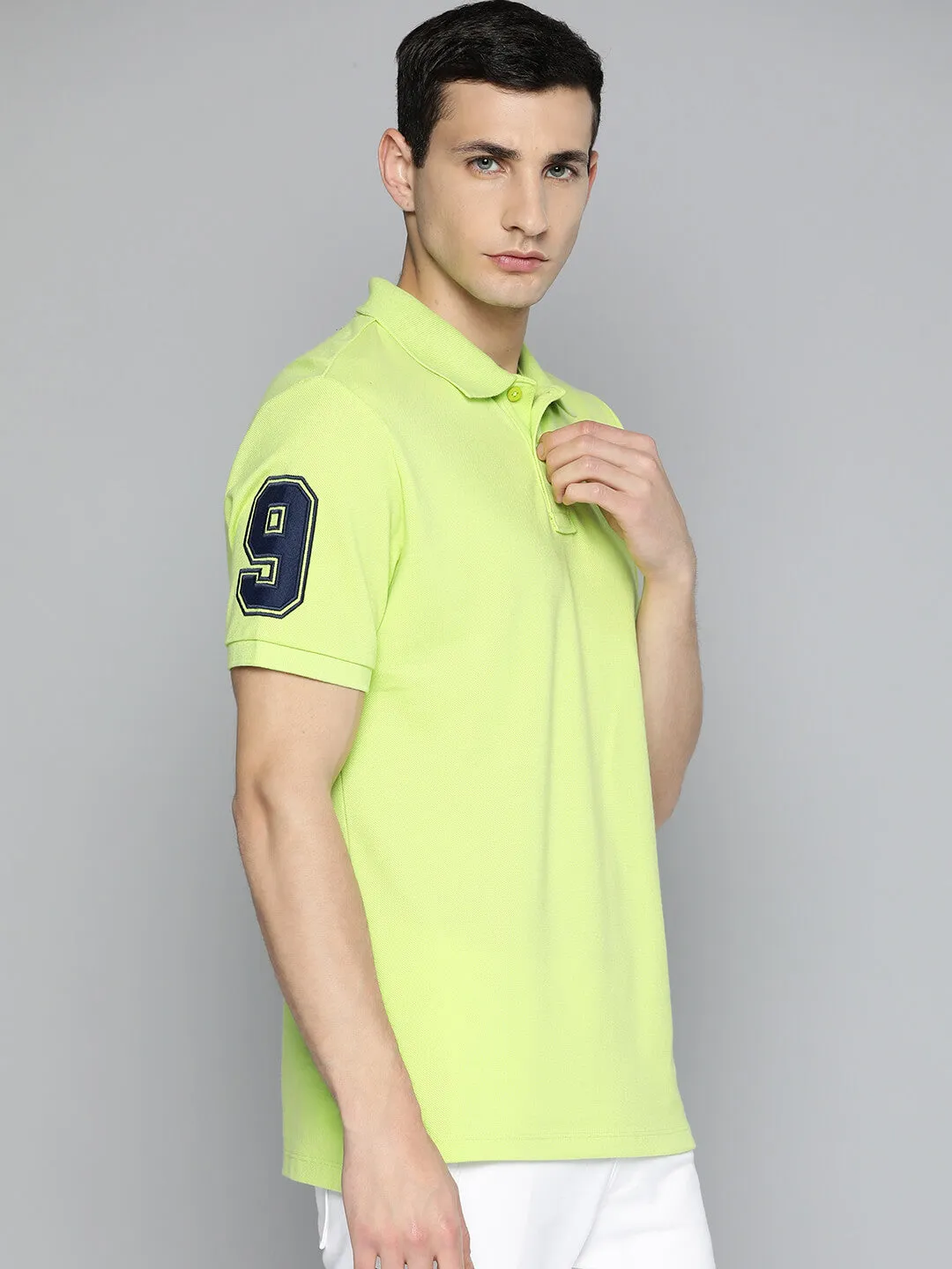 Alcis Men Lime Green Typography Printed Polo Collar Slim Fit T-shirt UV Protection Layered Hem Reinforcement