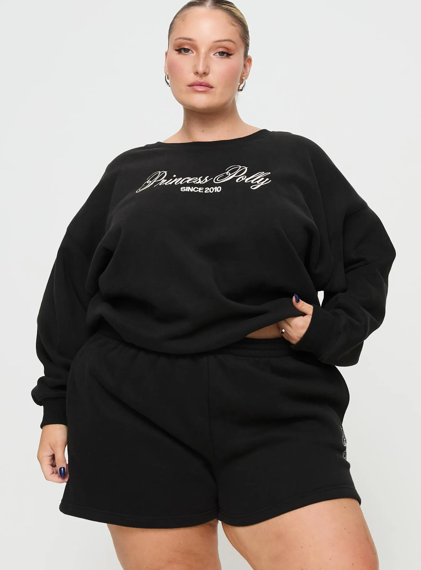 pack light LayeredConstruction Princess Polly Track Shorts Cursive Text Black Sand Curve