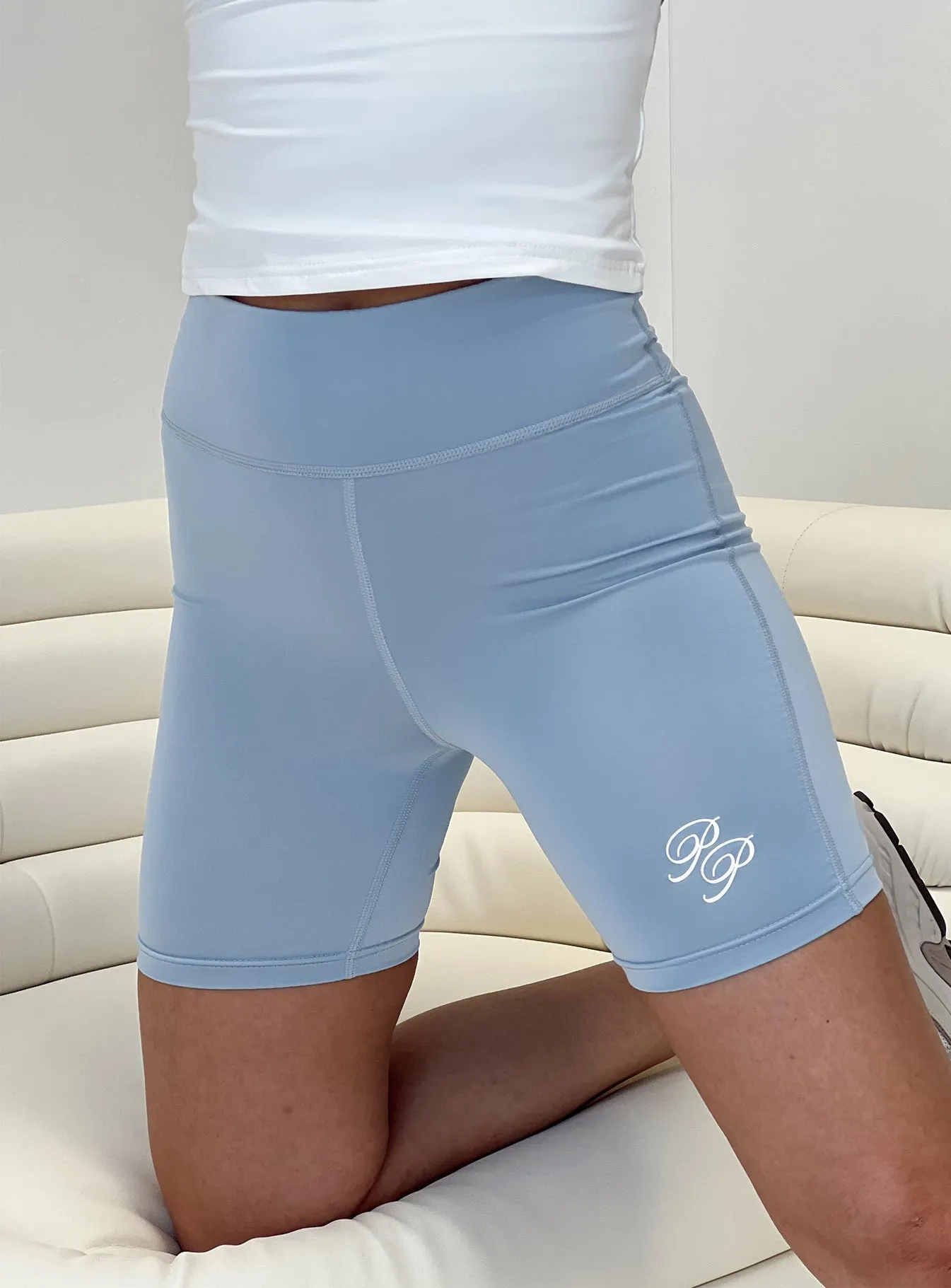 Princess Polly Bike Shorts Cursive Text Pale Blue/ Eggshell Creative Flow River Flow