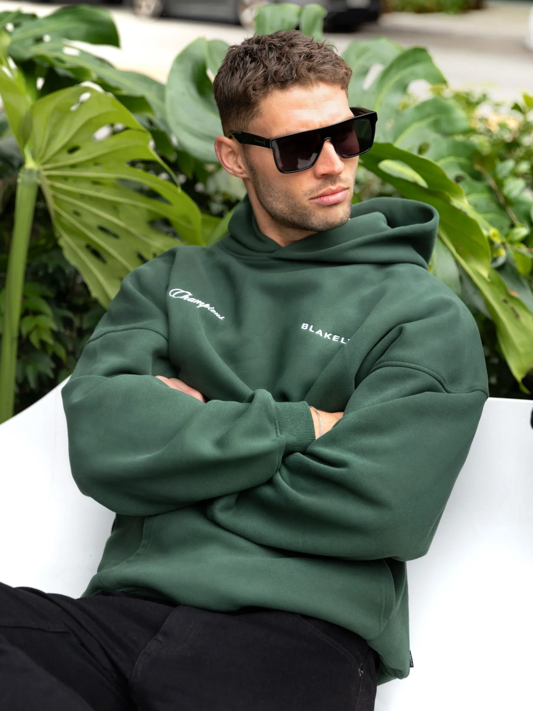 Skate Inspired Back Graphic Champions Legacy Relaxed Hoodie - Forest Green