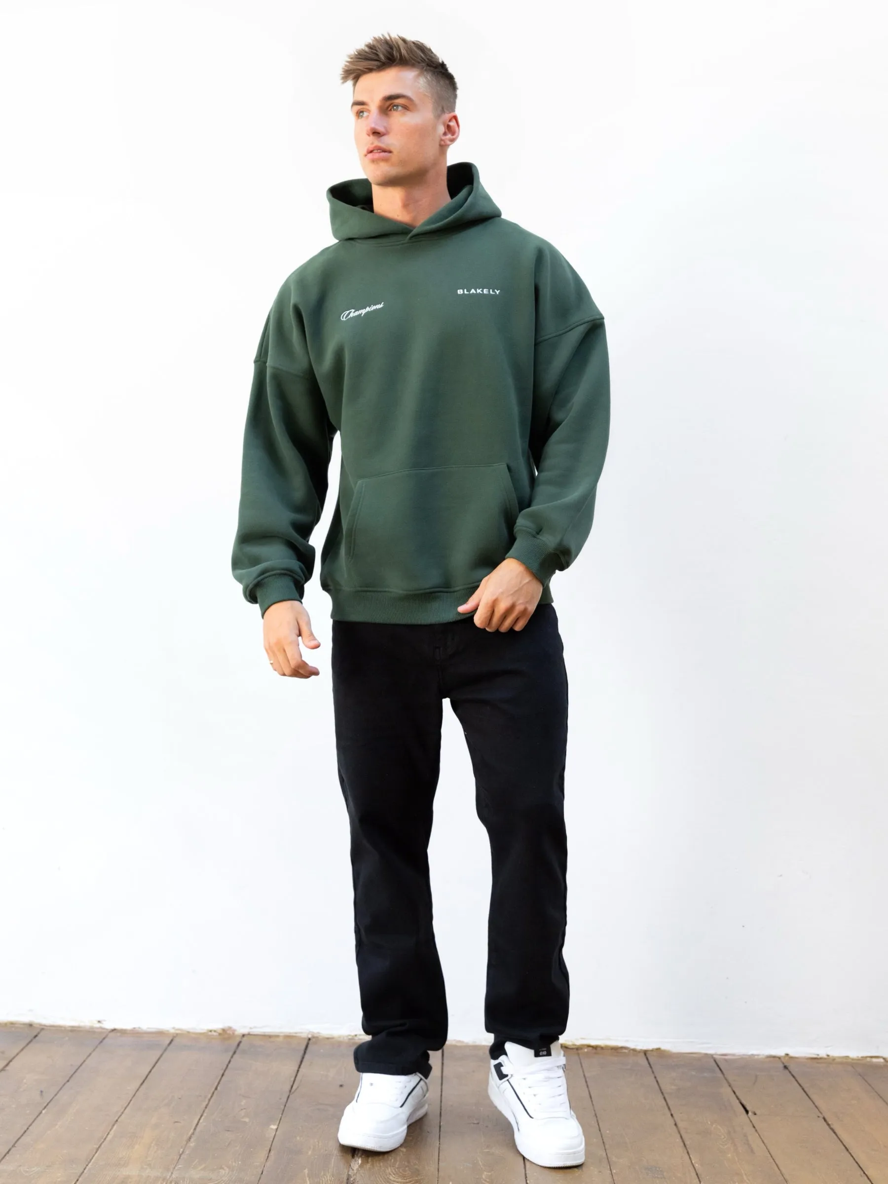 Eco Conscious Material Dragonfly like Champions Legacy Relaxed Hoodie - Forest Green