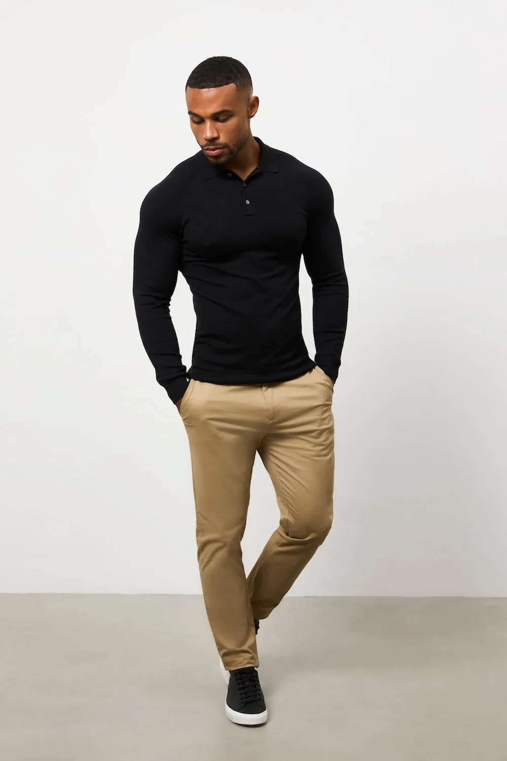 Knitted Polo Shirt in Black Unstructured Silhouette GarmentWashed Texture