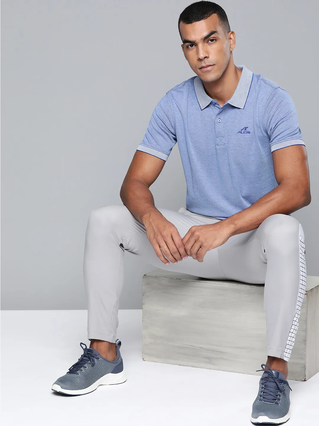 Alcis Men Blue Solid Polo Collar T-shirt All-day Comfort WrinkleResistant Finish