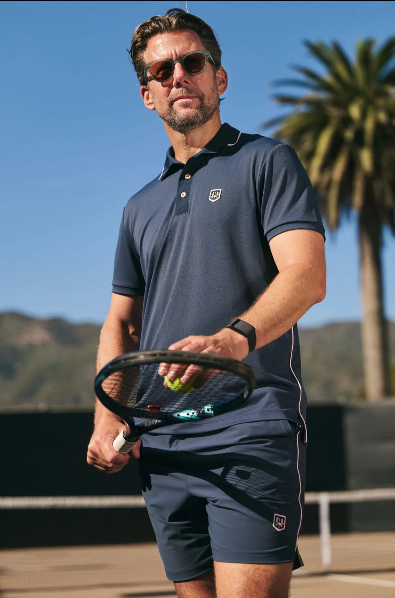 Retro IV Polo - Oceano di Mezzanotte / Bermuda Pink Golf Ready Unstructured Silhouette