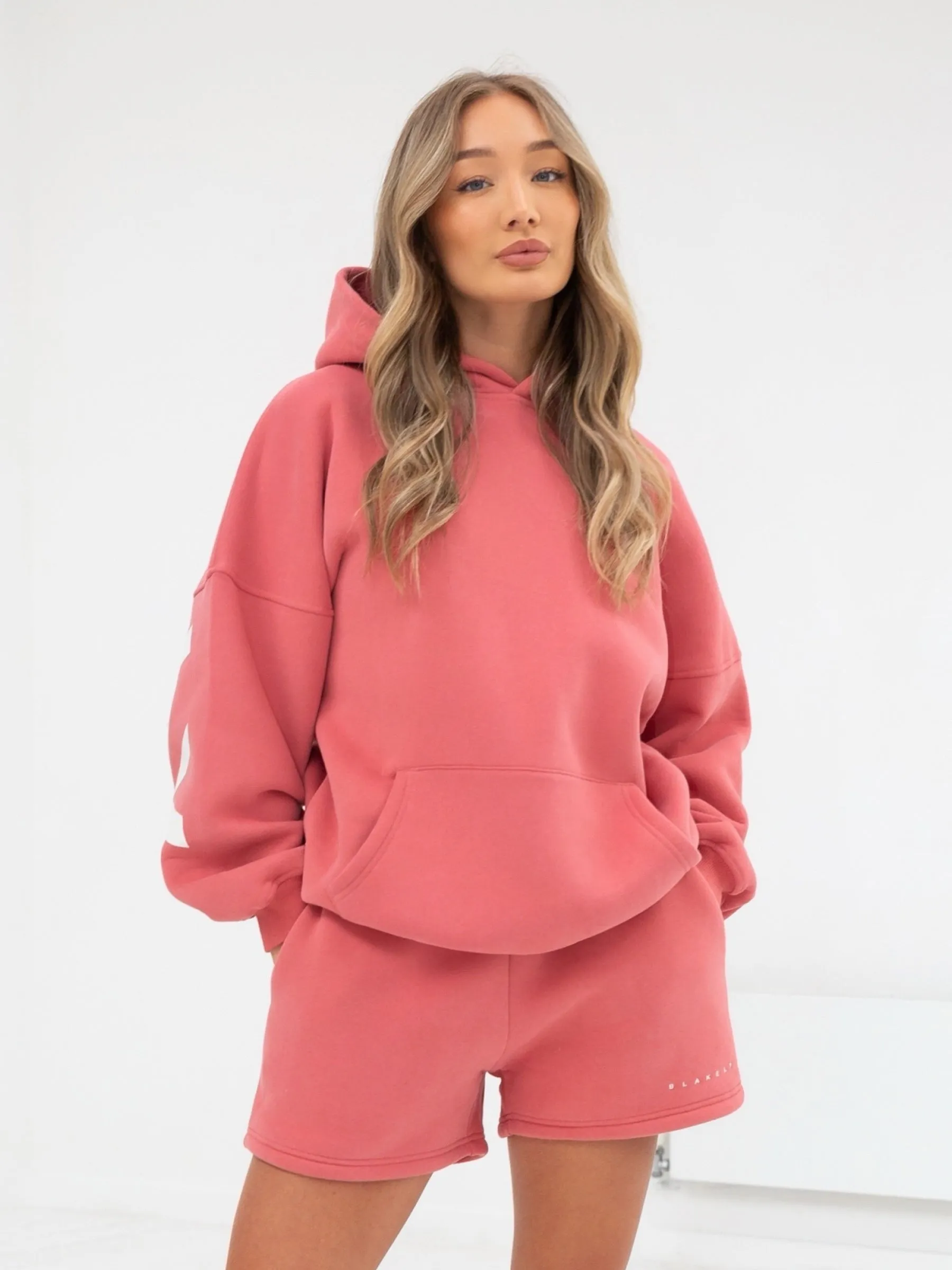 Isabel Oversized Hoodie - Sunrise Coral athletic style High end feel